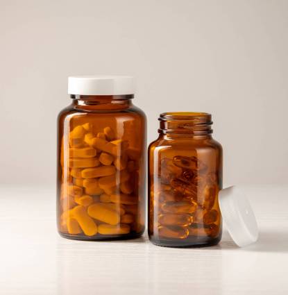 Vitamins, pills, omega 3, food supplements in glass jar, health and wellness. Food supplement Quality Compliance manufacturers supplement